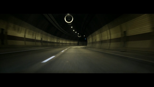 Video Reference: Black, Tunnel, Darkness, Atmosphere, Road, Light, Mode of transport, Lane, Infrastructure, Night