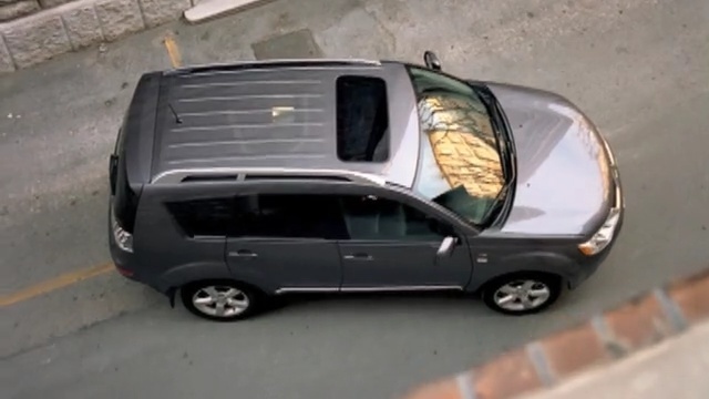 Video Reference: car, motor vehicle, vehicle, transport, mode of transport, sport utility vehicle, automotive tire, crossover suv, road, automotive exterior, Person