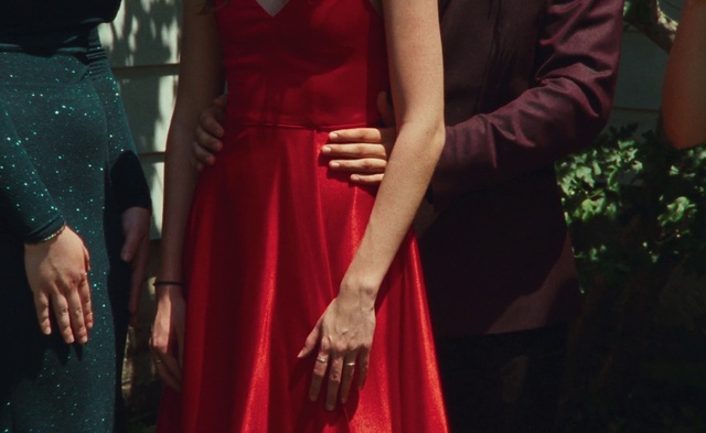Video Reference: Joint, Shoulder, One-piece garment, Sleeve, Waist, Gesture, Day dress, Fashion design, Blazer, Gown