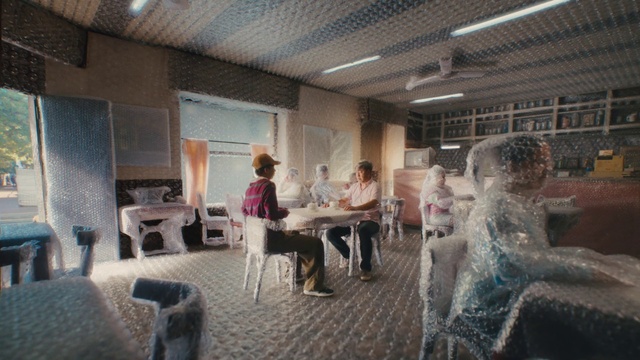 Video Reference: Chair, Flooring, Leisure, Wood, Event, Art, Room, Ceiling, Visual arts, Sitting