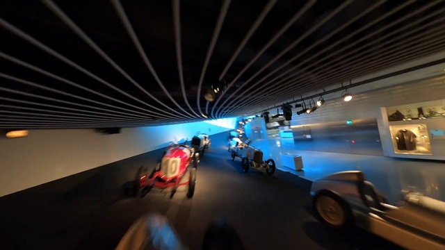 Video Reference: Tire, Building, Wheel, Automotive lighting, Automotive design, Vehicle, Electric blue, Electricity, Magenta, Event