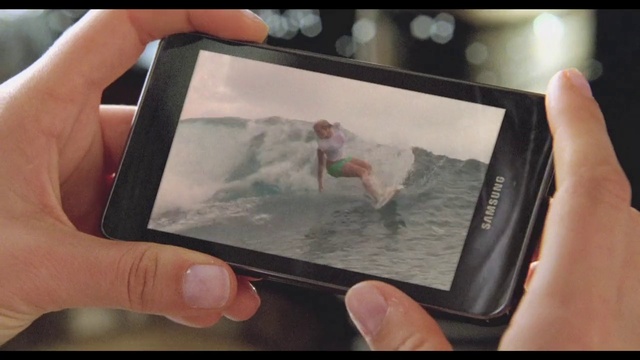 Video Reference: Hand, Tablet computer, Communication Device, Finger, Gadget, Gesture, Thumb, Material property, Rectangle, Display device