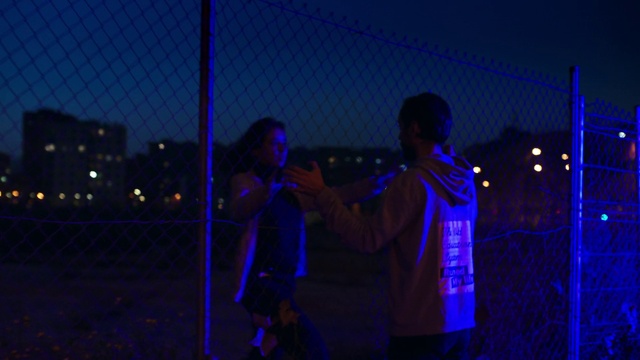 Video Reference: Sky, Purple, Blue, Violet, Entertainment, Fence, Electric blue, Performing arts, Magenta, Space