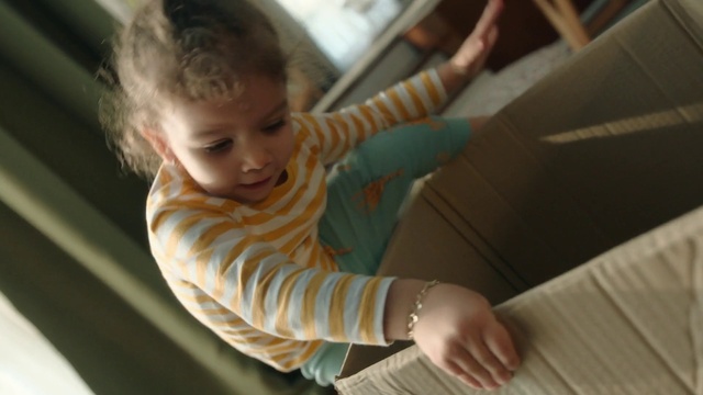 Video Reference: Skin, Hand, Baby, Wood, Toddler, Baby & toddler clothing, Plant, Comfort, Happy, Child