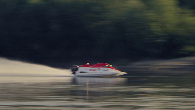 Video Reference: Water, Boat, Watercraft, Drag boat racing, Vehicle, Powerboating, Automotive design, Lake, Hydroplane racing, Atmospheric phenomenon
