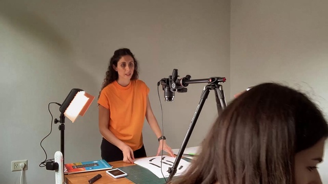 Video Reference: Microphone, Public address system, Fashion, Music, Microphone stand, Audio equipment, T-shirt, Electronic instrument, Table, Event