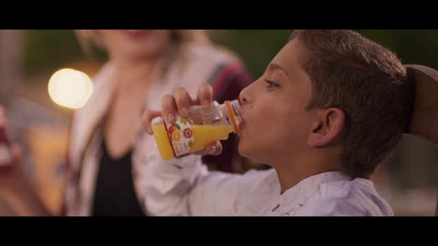 Video Reference: Nose, Hand, Drinkware, Ear, Happy, Gesture, Drinking, Food craving, Plastic bottle, Drink