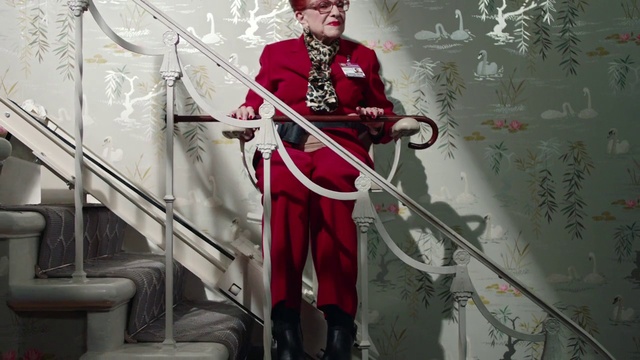 Video Reference: Outerwear, Hat, Music, Musician, Event, String instrument, Musical instrument, Uniform, Costume, Plucked string instruments