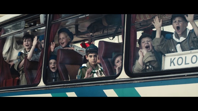 Video Reference: Motor vehicle, Bus, Vehicle, Automotive exterior, Eyewear, Public transport, Passenger, T-shirt, Fun, Crowd