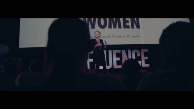 Video Reference: Font, Projection screen, Display device, Entertainment, Event, Rectangle, Projector accessory, Electric blue, Darkness, Multimedia