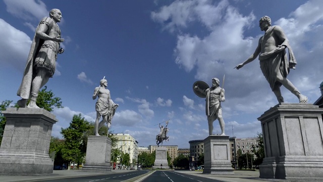 Video Reference: Cloud, Sky, Plant, Daytime, Statue, Sculpture, Pedestal, Art, Tree, Landmark