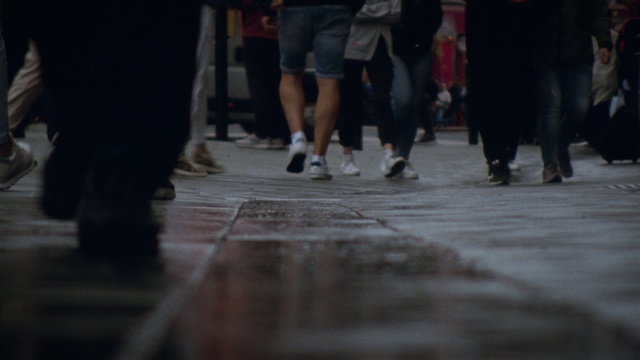 Video Reference: Shoe, Leg, Shorts, Road surface, Asphalt, Thigh, Flooring, Sidewalk, Sneakers, Road