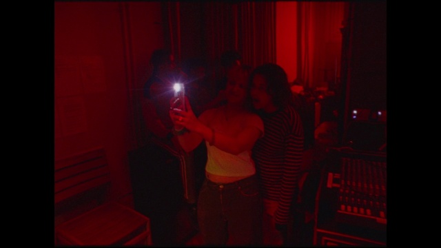 Video Reference: Curtain, Magenta, Entertainment, Event, T-shirt, Font, Fun, Room, Darkness, Visual effect lighting