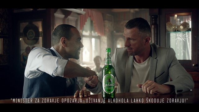 Video Reference: Muscle, Drinkware, Bottle, Flash photography, Alcoholic beverage, Drink, Barware, Fun, Event, T-shirt