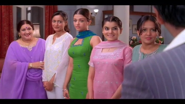 Video Reference: Face, Smile, Shoulder, One-piece garment, Purple, Happy, Dress, Pink, Fashion design, Formal wear