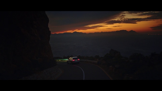 Video Reference: Cloud, Sky, Automotive lighting, Car, Afterglow, Automotive design, Sunset, Automotive mirror, Dusk, Automotive exterior