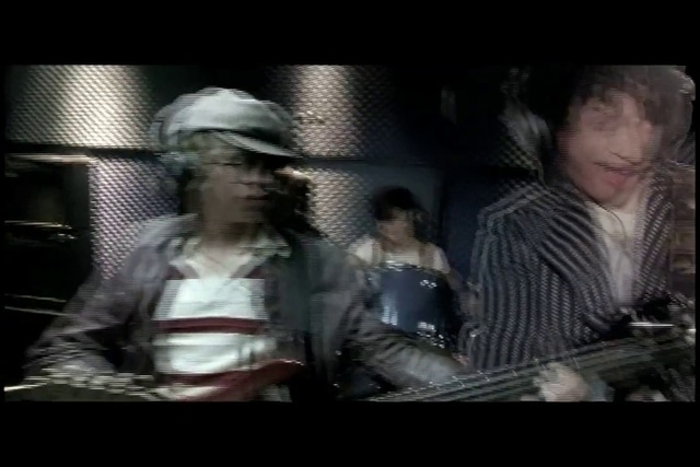 Video Reference: Flash photography, Hat, Entertainment, Cool, Movie, Font, Music, Display device, Event, Glass