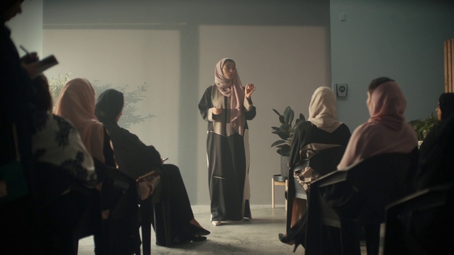 Video Reference: Shoe, Fashion design, Entertainment, Event, Art, Chair, Boot, Visual arts, Conversation, Performance