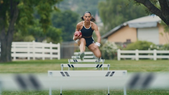 Video Reference: Hurdling, Track and field athletics, Sports equipment, Shorts, Obstacle race, Watch, Hurdle, Multi-sport event, Grass, Exercise