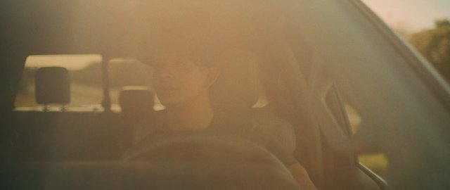 Video Reference: car, window, person, driver, backlit, sunlight, reflection, interior, travel, portrait, hazy, silhouette