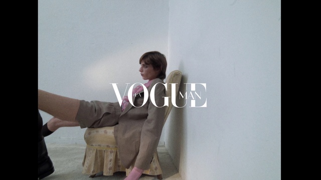 Video Reference: Flash photography, Sleeve, Comfort, Gesture, Happy, Fashion design, Font, Event, Magenta, Sitting