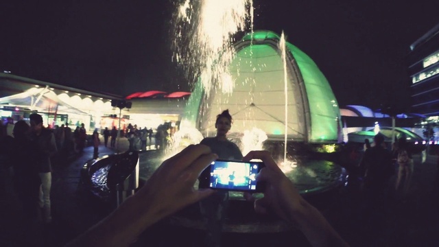 Video Reference: Water, Building, Automotive lighting, Entertainment, Midnight, Fun, Fountain, Crowd, City, Technology