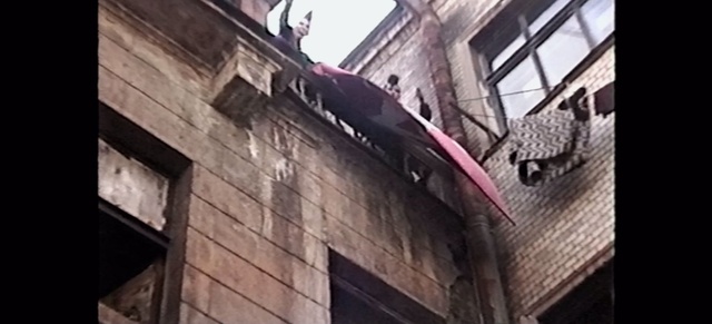 Video Reference: Building, Window, Neighbourhood, Fixture, Material property, Facade, Brick, City, Brickwork, Font