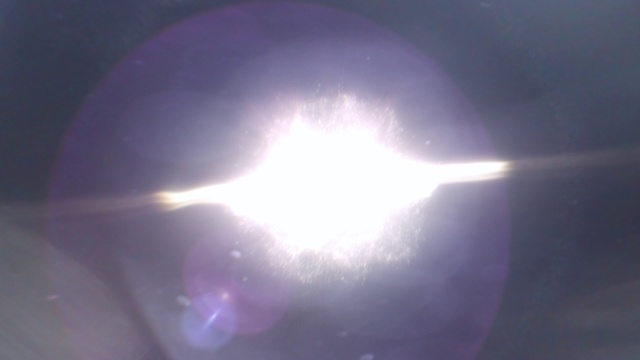 Video Reference: Sky, Cloud, Automotive lighting, Astronomical object, Lens flare, Water, Gas, Electric blue, Symmetry, Circle