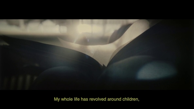 Video Reference: Hood, Automotive lighting, Tints and shades, Automotive design, Font, Petal, Darkness, Electric blue, Automotive exterior, Vehicle door