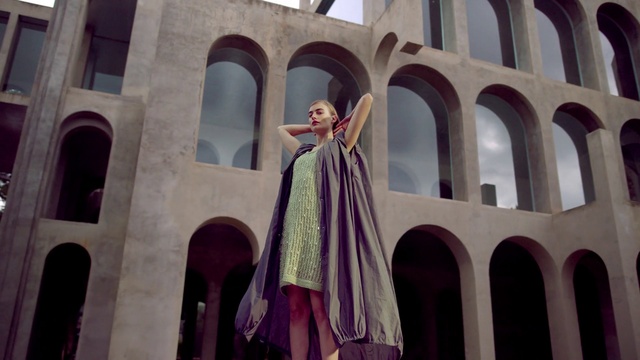 Video Reference: Building, Purple, Window, Pink, Line, Material property, Facade, Symmetry, People, Landmark