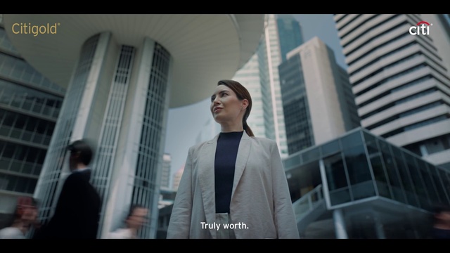 Video Reference: Building, Flash photography, Sleeve, Tower block, Blazer, Formal wear, City, White-collar worker, Event, Fashion design