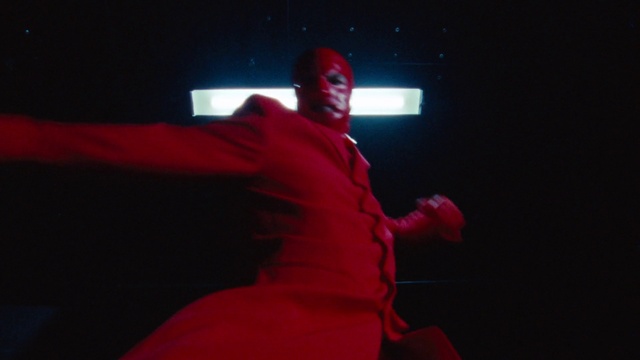 Video Reference: Sleeve, Performing arts, Entertainment, Artist, Performance art, Magenta, Event, Music, T-shirt, Fictional character