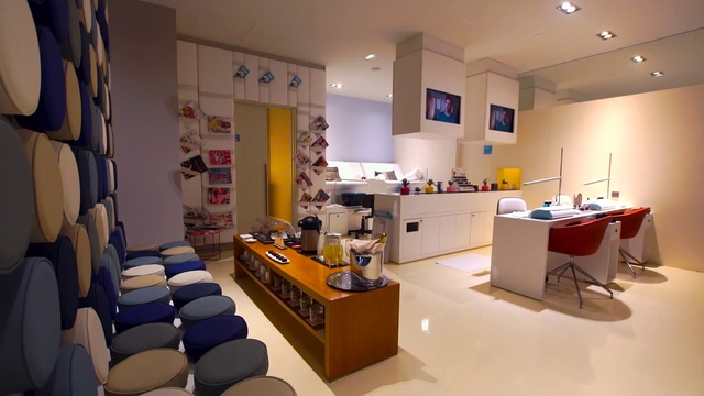 Video Reference: Table, Furniture, Interior design, Desk, Architecture, Chair, Flooring, Floor, Ceiling, Houseplant