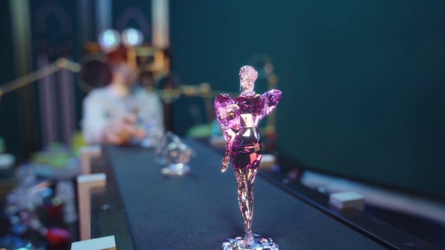 Video Reference: Purple, Plant, Violet, Art, Magenta, Electric blue, Event, Religious item, Entertainment, Machine