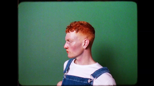 Video Reference: Jaw, Flash photography, Gadget, Television set, Rectangle, Vest, Television, Display device, Electronic device, Event