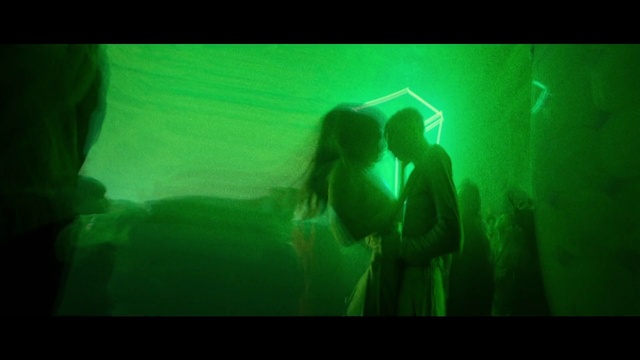 Video Reference: Entertainment, Rectangle, Font, Visual effect lighting, Magenta, Event, Display device, Darkness, Electric blue, Fun