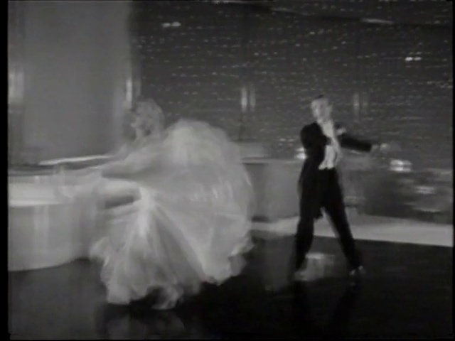 Video Reference: Wedding dress, Dress, Bride, Flash photography, Dance, Gesture, Performing arts, Happy, Black-and-white, Entertainment