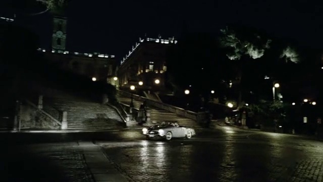 Video Reference: Car, Automotive lighting, Vehicle, Tire, Road surface, Headlamp, Asphalt, Tints and shades, Street light, City