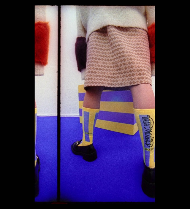 Video Reference: Human body, Sleeve, Waist, Thigh, Knee, Dress, Street fashion, Chair, Headgear, Red