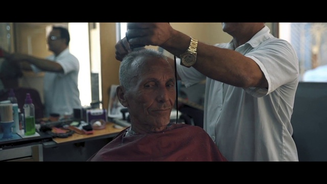 Video Reference: Forehead, Watch, Joint, Hairstyle, Barber, Temple, Sleeve, Gesture, Beauty salon, Clock