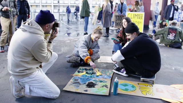 Video Reference: Clothing, Trousers, Artist, Art, Jacket, Leisure, Recreation, Hat, Publication, Event