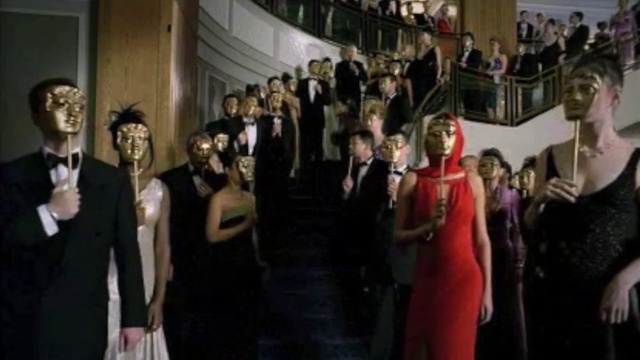 Video Reference: Dress, Tie, Hat, Entertainment, Suit, Formal wear, Event, Fashion design, Crowd, Flooring