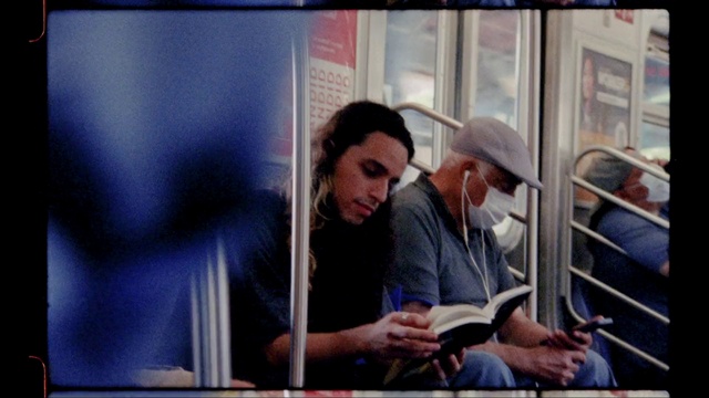 Video Reference: Hat, Electronic device, Event, White-collar worker, Public transport, Fun, Conversation, T-shirt, Display device, Passenger