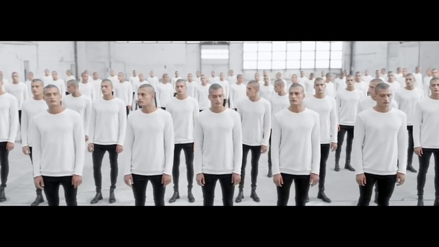 Video Reference: Clothing, Outerwear, Shorts, Sleeve, Standing, T-shirt, Font, Uniform, Symmetry, Event