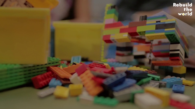 Video Reference: Colorfulness, Product, Rectangle, Toy block, Font, Plastic, Electric blue, Event, Educational toy, Sweetness