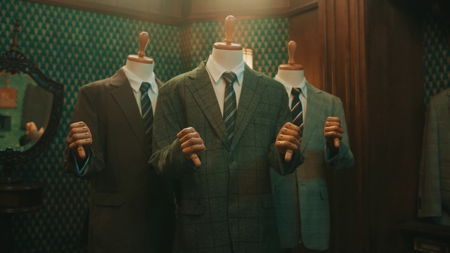 Video Reference: Outerwear, Dress shirt, Tie, Coat, Sleeve, Gesture, Collar, Window, Suit, Flash photography