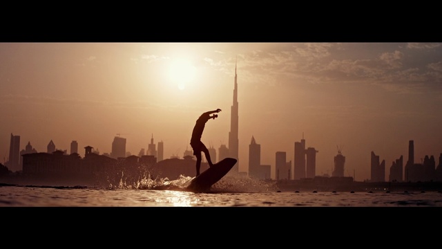 Video Reference: Water, Sky, Atmosphere, Daytime, Cloud, Afterglow, Dusk, Sunlight, Body of water, Skyscraper