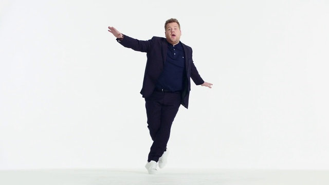 Video Reference: Trousers, Smile, Leg, Dress shirt, Sleeve, Flash photography, Happy, Gesture, Collar, Thumb