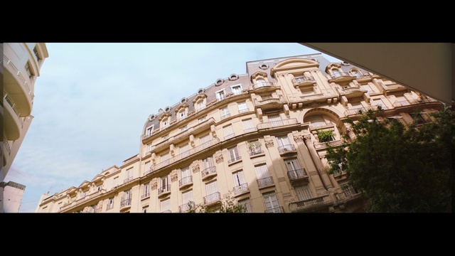 Video Reference: Sky, Building, World, Urban design, Window, Condominium, Tints and shades, Tower block, Facade, Symmetry