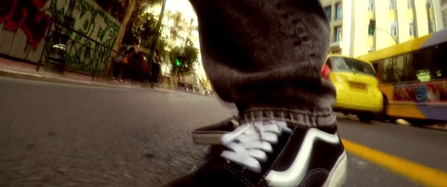 Video Reference: Plant, Road surface, Asphalt, Gesture, Yellow, Thigh, Sportswear, Knee, Waist, Tree